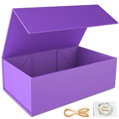 an open purple box with scissors next to it