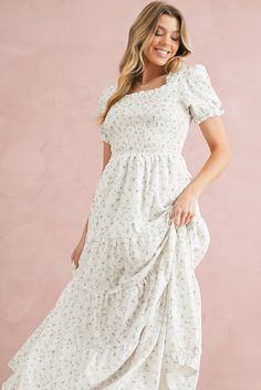 Material:100%Polyester Embrace elegance with our dress, crafted from a soft and flowy fabric that offers a blend of comfort and style, perfect for both casual and special occasions. This maxi dress features a charming frill neckline, a figure-flattering shirred bodice, a vibrant floral print, and a graceful flowing silhouette, creating a romantic and feminine look that is sure to make a statement. The versatile design of this dress allows for easy pairing with heels for a formal event, sandals f Flowy Square Neck Midi Sundress, Flowy Square Neck Sundress Midi Dress, Flowy Square Neck Midi Dress For Vacation, Flowy Midi Dress With Square Neck For Vacation, Flowy Mid-length Ruched Dress, Elegant Dresses With Smocked Back And Billowy Fit, Flowy Square Neck Dress For Day Out, Spring Chiffon Maxi Dress With Square Neck, Flowy Ruched Maxi Dress For Garden Party