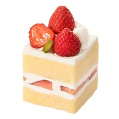 a piece of cake with strawberries on top