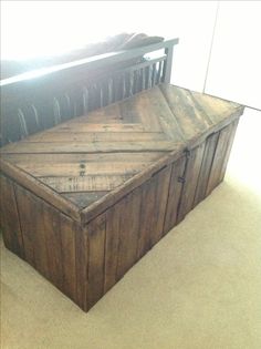 an old wooden box sitting on the floor