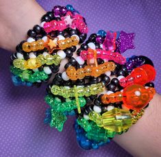 What's black and white and rainbow all over?  These super fun pony bead KANDI CUFFS!  Choose between stars beads, flat star charms and transparent chunky beads.  Choose large (36 beads around) or small (30 beads around).  Super colorful & fun! Bead Kandi, Rainbow Choker, Kandi Cuffs