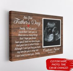 a wooden sign with a photo and text on it that says, our first father's day