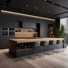 a modern kitchen with an island counter and bar stools in the middle of it