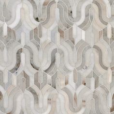 an abstract marble mosaic tile design with wavy lines and curves in grey, white and beige colors