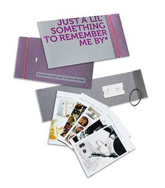 an assortment of personal items including a ring, brochure, and magazine on a white background