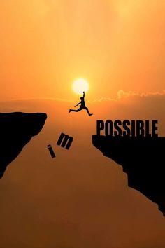 a man jumping off the edge of a cliff into the ocean with words impossible above him