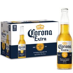 two bottles of corona extra beer next to an open box with the same label on it