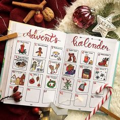 an open christmas planner with ornaments and decorations