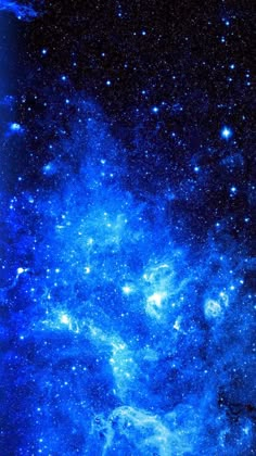 an image of the night sky with stars and blue hues on black background, as seen from space