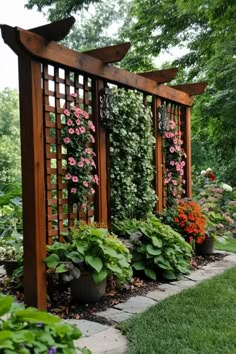 a wooden arbor with flowers growing on it