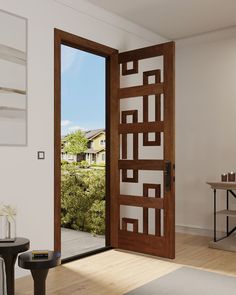 an open wooden door in a white room