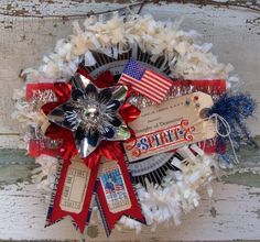 a red, white and blue patriotic wreath