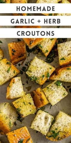 homemade garlic and herb croutons on a sheet of parchment paper with text overlay