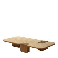 a wooden table with two different shapes on it's sides and one is made out of wood