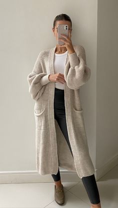 Elegant Open Front Cardigan For Fall, Elegant Beige Soft Knit Cardigan, Chic Long Sleeve Neutral Sweater, Chic Long Sleeve Neutral Cardigan, Chic Neutral Long Sleeve Cardigan, Chic Cream Sweater For Fall, Elegant Long Knit Outerwear, Elegant Long Sweater For Fall, Elegant Long Fall Sweater