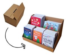 an open cardboard box with several children's books in it, and the bottom half is empty