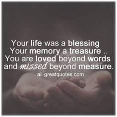 someone holding their hands together with the words, your life was a blessing you are loved beyond words and missed beyond measure