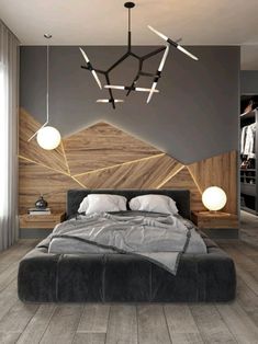 a bedroom with grey walls and wooden flooring