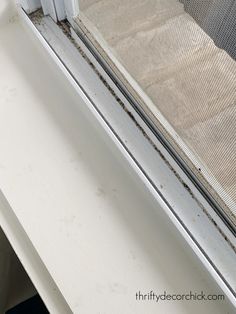 the window sill is dirty and needs to be cleaned