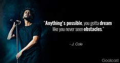 a man holding a microphone in front of a black background with a quote from j cole