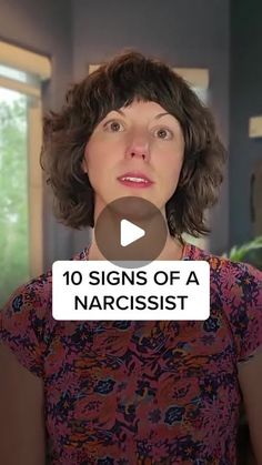 a woman standing in front of a window with the words 10 signs of a narcisst