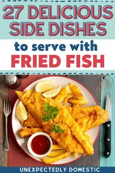 fried fish on a plate with sauce and lemon wedges