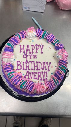 a birthday cake with the words happy 11th birthday avery on it and sprinkles