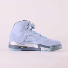 The Air Jordan 5 Bluebird is inspired by WWII fighter planes. Released October 7th, 2021.* Sky Blue suede upper* Genuine leather material* Fabric sleeve for comfortable fit* TPU lace guardsSize and Fit* Fits true to size Wwii Fighter Planes, Nike Air Jordan 5, Wwii Fighters, Sneaker Stores, Air Jordan 5, Jordan 5, Fighter Planes, Bluebird, Blue Suede