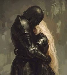 a woman with long blonde hair hugging a man in armor, both dressed in black