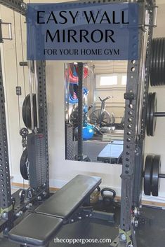 a home gym with the words easy wall mirror for your home gym