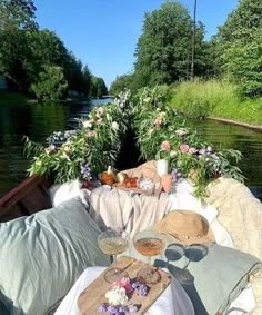 a boat filled with lots of food and flowers