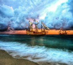 two ships are sailing in the ocean on a cloudy day with blue sky and white clouds