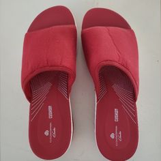 Cloudsteppers By Clarks Slip On Sandals, Red And White, Size 9m, Cushion Soft, 1 3/4" At Heel And Graduates To 1" Thick. Super Comfy ! Never Used Closed Toe Synthetic Slippers With Ortholite Insole, Closed Toe Slippers With Ortholite Insole, Casual Red Sandals With Textured Footbed, Red Flat Slippers With Cushioned Footbed, Red Cushioned Flat Slippers, Red Synthetic Slippers, Red Non-slip Slip-on Slippers, Red Flat Synthetic Slippers, Red Comfortable Slip-on Slippers