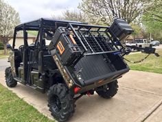 a large utility vehicle parked on the sidewalk