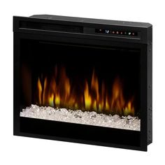 Multi-Fire XHD Series Plug-in Electric Firebox by Dimplex DIMPLEX MULTI-FIRE XHD SERIES PLUG-IN ELECTRIC FIREBOX WITH GLOWING LOGS OR ACRYLIC ICE MEDIA Dimplex Multi-Fire XHD Series Plug-in Electric Firebox is a contemporary fireplace designed to provide adequate heat indoors without the hassle of traditional wood-burning fireplaces. The thin black glass in front of this fire feature highlights the stunning glow of its flames and media. This electric firebox is available in three sizes and can be purchased with logs or glass as its decorative media. Utilizing the LED Dimplex flame technology and Multi-Fire XHD flame effect, its lifelike high-contrast flames mimic the view of a traditional fireplace providing an inviting and cozy ambiance. The 5118 BTU heat output of its fan-forced ceramic Dimplex Electric Fireplace Insert, Contemporary Electric Fireplace, Artificial Fireplace, Black Electric Fireplace, Dimplex Electric Fireplace, Contemporary Fireplace Designs, Black Fireplace, Electric Fireplace Insert, Ceramic Heater