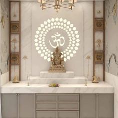 the interior of a room with a buddha statue on top of a white countertop