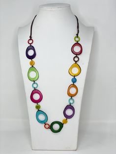 This Product is handcrafted from a palm tree nut native to the tropical rainforests. Adjustable Cord. Lightweight. Special to use in casual events. Beautiful gift. condition is new without labels. Packed in a gift box. Tagua Nuts, Bib Necklaces, Handcrafted Artisan Jewelry, Set Necklace, Necklace And Earrings, Funky Art, Art Jewelry, Artisan Jewelry, Palm Tree