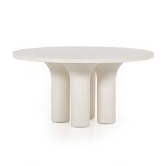 This Parra Dining Table - Plaster Molded Concrete is made from plaster-molded concrete with a cylindrical pillar-style base tapering slightly to support a smooth, white-finished tabletop. We love the texture and brightness this brings to any dining room or kitchen area.   Overall Dimensions: 59.75w x 59.75d x 30.00h Concrete Dining Table, Concrete Materials, Entertainment Table, Concrete Molds, Plaster Molds, Mcgee & Co, White Table Top, White Concrete, High Fashion Home