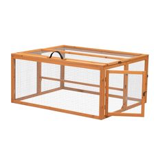 a large wooden chicken coop with two doors