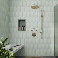 a bathroom with green walls and floor tiles