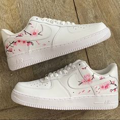 Cherry blossom flowers hand painted on a all white AF1. Painted with water resistant and non cracking leather paint. Custom Nike Baby, Cherry Blossom Air Force 1, Painted Air Force 1 Flowers, Nike Air Force 1 Flowers, Air Force One Shoes Custom, White Sneaker Painting Ideas, Flower Air Force 1, Personalised Air Force 1, Costume Air Force 1s