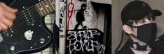 a man wearing a face mask and holding a guitar in front of him with graffiti on the wall behind him