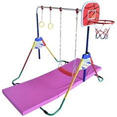 a pink swing set with a basketball hoop