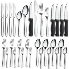 an assortment of forks, knives and spoons on a white background