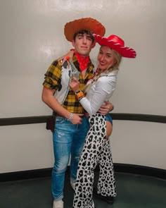 a man and woman are dressed up as cowgirls for the costume contest on halloween