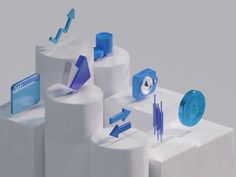 an image of some blue and white objects in the shape of columns with arrows on them