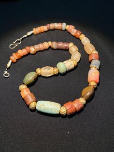 Ancient carnelian agate beads necklace from Neolithic period very good condition The origin of this bead are from sub Sahara Africa The age of this beads are more than 5000 years old some gold plated wax beads are used as counter beads very rare items for collection and study we provide fast and free shipping to our customers by which can get the items by 7 maximum working days Neolithic Period, Beach Jewelry Boho, Wax Beads, Carnelian Agate, Rare Items, Carnelian Jewelry, Brass Statues, Stone Age, Agate Jewelry