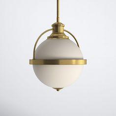 a white and gold light hanging from a ceiling