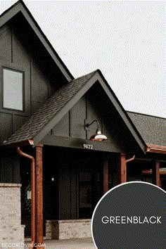 a black house with the words greenblack over it's front door and windows