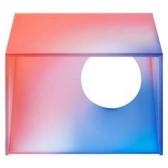 an image of a blue and pink object with a white circle in the middle of it